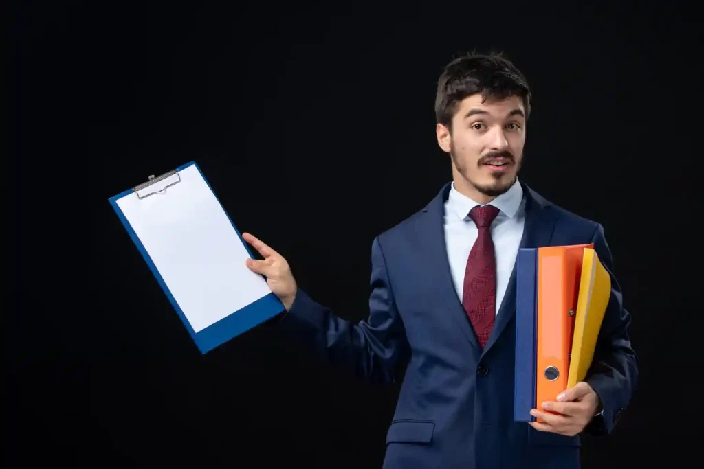 man holding several documents and asking something, lemonlawassist