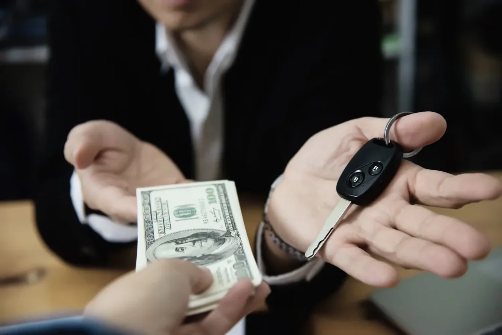 man paying attorney fees, lemonlawassist