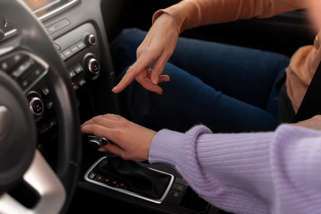 Woman taking her driver's automatic transmission, lemonlawassist