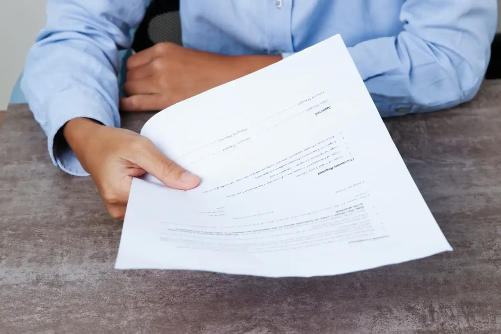 High angle signing document